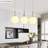 Minimalist Glass Pendant Light In White For Dining Room Table