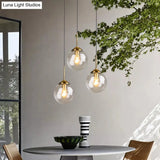 Minimalist Glass Sphere Pendant Light Fixture For Modern Indoor Ceiling Lighting