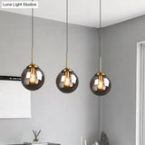 Minimalist Glass Sphere Pendant Light Fixture For Modern Indoor Ceiling Lighting