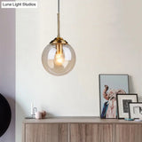 Minimalist Glass Sphere Pendant Light Fixture For Modern Indoor Ceiling Lighting