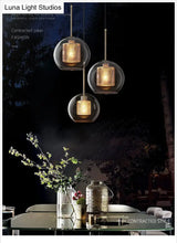 Minimalist Glass Spherical Pendant Light Fixture In Bronze