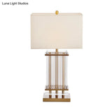 Minimalist Gold Desk Lamp With Clear Glass Bars - White Fabric Rectangle Night Table Light