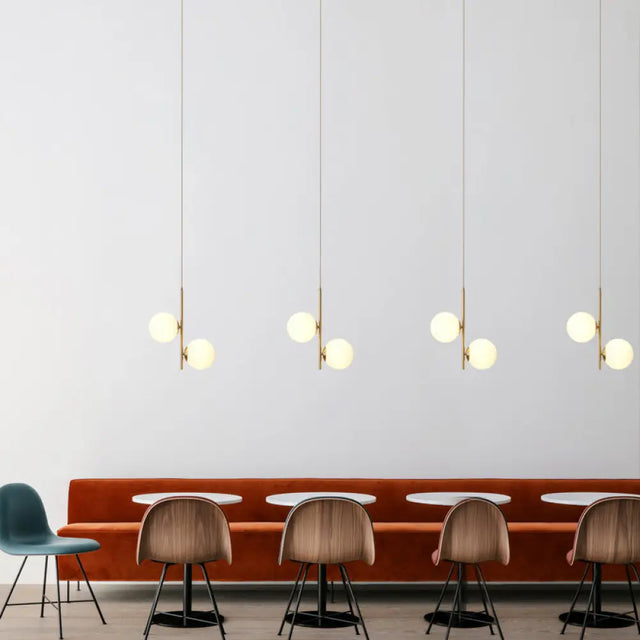 Modern Gold Suspended Light Fixture With Opaque Glass Spheres - Ideal For Dining Room Décor