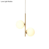 Minimalist Gold Suspension Chandelier: Opaque Glass Spherical 2-Head Light For Dining Room