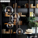 Minimalist Hand-Blown Glass Globe Hanging Lamp - Gold Finish Pendant Light