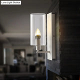 Minimalist Metal Candle Wall Lamp With Clear Glass Shade - White 1-Head Sconce Light Fixture