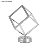 Minimalist Metal Led Bedside Lamp With Chrome Finish - Cubic Frame Round Base