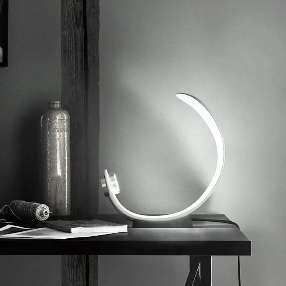 Minimalist Moon Shape Led Metallic Table Lamp With White Finish For Bedside Lighting