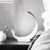 Minimalist Moon Shape Led Metallic Table Lamp With White Finish For Bedside Lighting