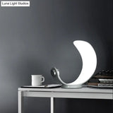 Minimalist Moon Shape Led Metallic Table Lamp With White Finish For Bedside Lighting