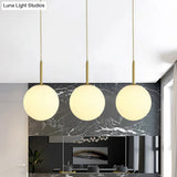 Minimalist Opal Glass Sphere Pendant Light With 3-Bulb Gold Pendulum Design - Ideal For Dining Room