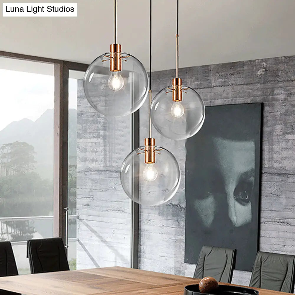 Minimalist Rose Gold Cluster Pendant With Clear Glass For Ceiling - 3-Bulb Fixture