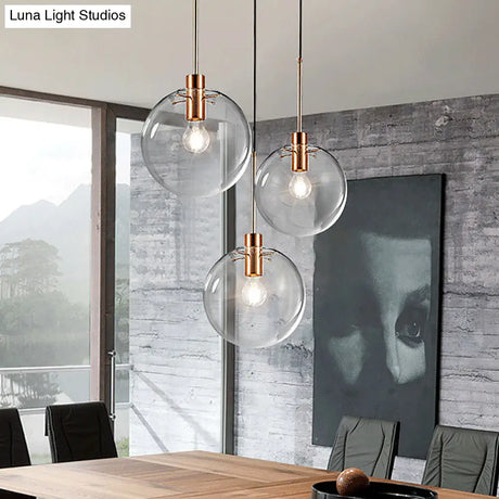 Minimalist Rose Gold Cluster Pendant With Clear Glass For Ceiling - 3-Bulb Fixture
