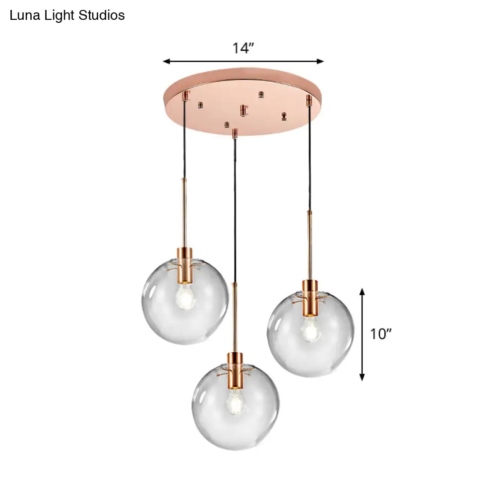 Minimalist Rose Gold Cluster Pendant With Clear Glass For Ceiling - 3-Bulb Fixture