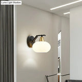 Minimalist White Glass Ellipse Wall Light Fixture - Single Black Sconce For Bedroom