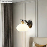 Minimalist White Glass Ellipse Wall Light Fixture - Single Black Sconce For Bedroom