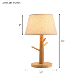 Minimalist Wood Tree Branch Nightstand Lamp With White Tapered Fabric Shade