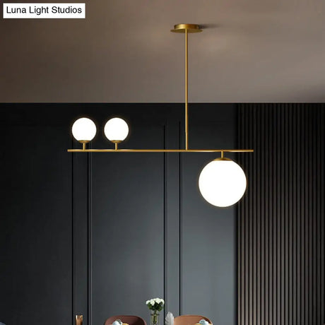 Minimalistic Brass Ball Pendant Light: Opal Glass Island Lighting For Dining Room (3-Light)