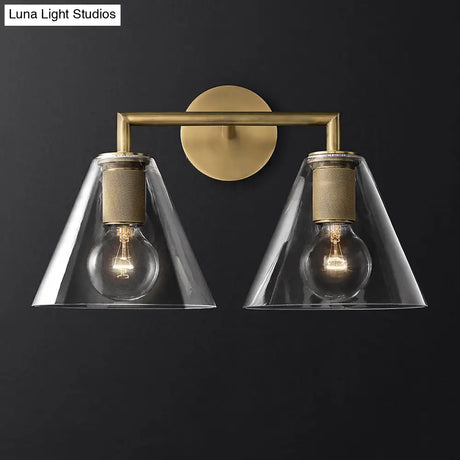 Minimalistic Brass Wall Sconce With Clear Glass For Bedside Lighting
