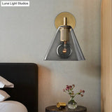 Minimalistic Brass Wall Sconce With Clear Glass For Bedside Lighting
