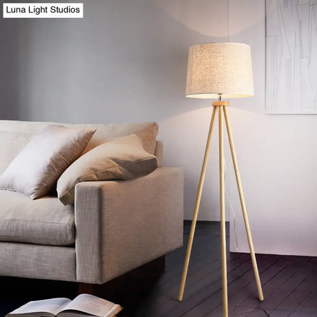 Minimalistic Tripod Floor Lamp With White Drum Shade - 1 Light Fabric