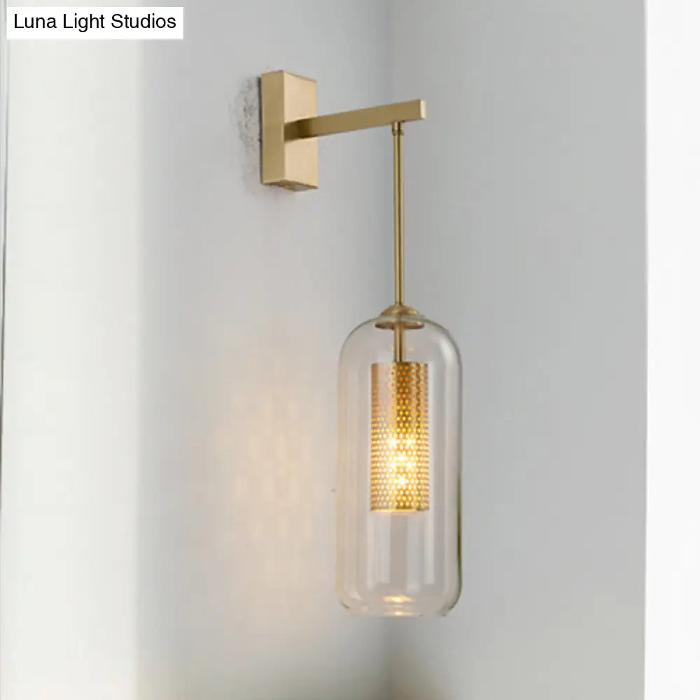 Modern 1-Head Gold Wall Mount Light For Bedside - Clear Glass Capsule Sconce Fixture