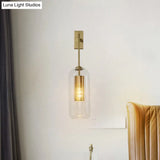 Modern 1-Head Gold Wall Mount Light For Bedside - Clear Glass Capsule Sconce Fixture