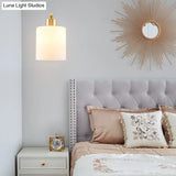 Modern 1-Light Brass Cylinder Sconce With Milk Glass Shade - Wall Lighting Fixture