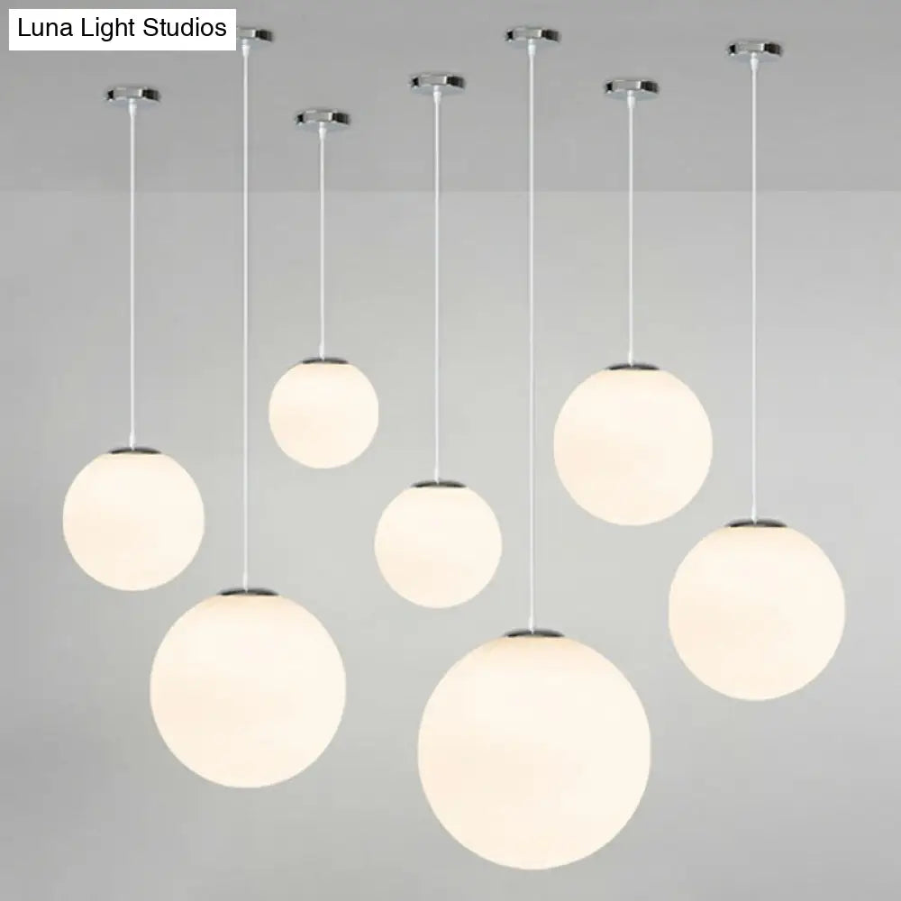 Modern 1 Light Glass Ball Pendant For Clothing Store Ceiling Simple & White