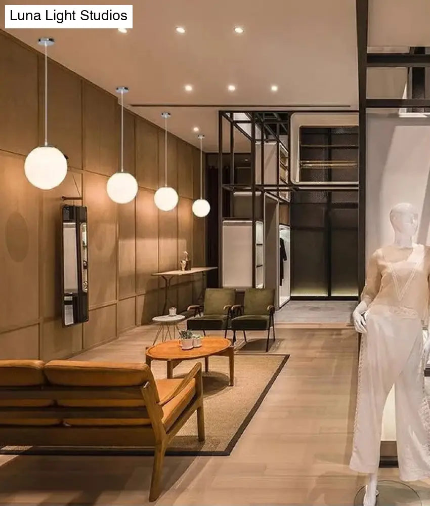 Modern 1 Light Glass Ball Pendant For Clothing Store Ceiling Simple & White