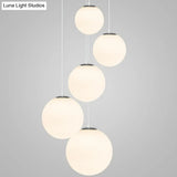 Modern 1 Light Glass Ball Pendant For Clothing Store Ceiling Simple & White