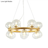 Modern 12-Bulb Gold Chandelier With Clear Glass Shade - Stylish Globe Suspension Light