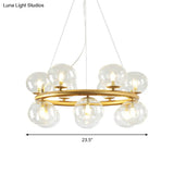 Modern 12-Bulb Gold Chandelier With Clear Glass Shade - Stylish Globe Suspension Light