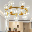 Modern 12-Bulb Gold Chandelier With Clear Glass Shade - Stylish Globe Suspension Light