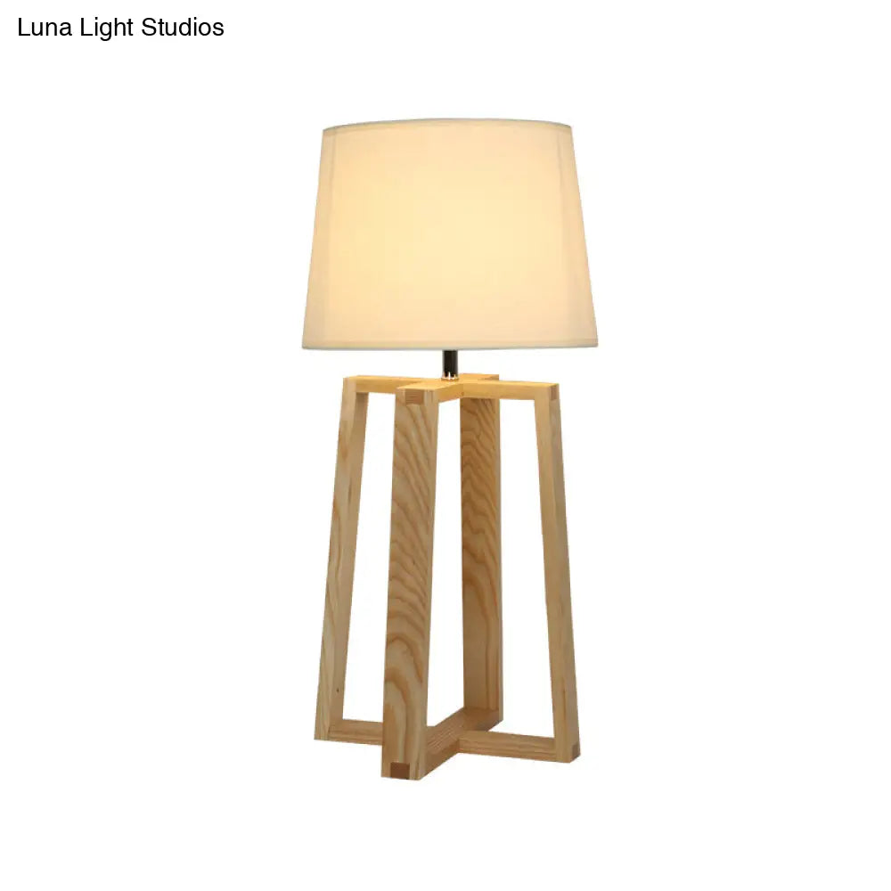 Modern Beige Trapezoid Nightstand Lamp With Wood Base And Tapered Fabric Shade