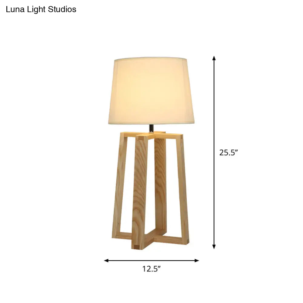 Modern Beige Trapezoid Nightstand Lamp With Wood Base And Tapered Fabric Shade