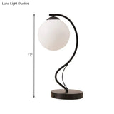 Modern Black Task Lamp With Frosted Glass Globe Shade
