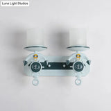 Modern Blue Wall Light With Cylindrical Dimpled Glass Shade - Sleek 1/2-Head Doorway Lighting