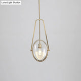 Modern Brass Pendant Light With Clear Glass Shade And Unique Halberd Frame