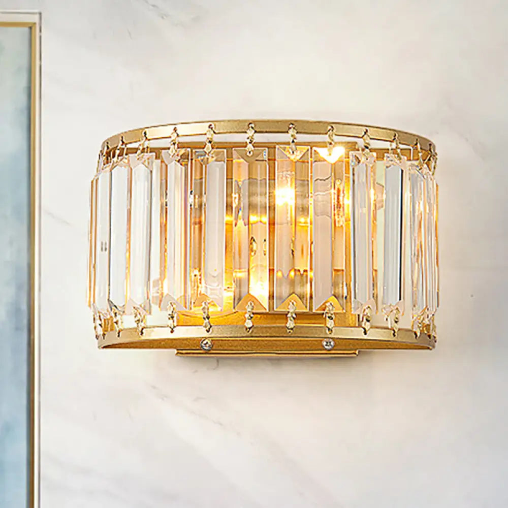 Modern Brass Wall Sconce With Drum-Shaped Clear Crystal Shade - 1 Light Living Room Lighting Fixture
