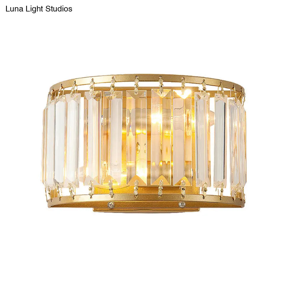 Modern Brass Wall Sconce With Drum-Shaped Clear Crystal Shade - 1 Light Living Room Lighting Fixture