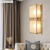 Modern Brass Wall Sconce With Frosted Glass - Sleek Corridor Lighting