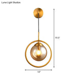 Modern Brass Wall Sconce With Glass Sphere Shade For Bedside Lighting