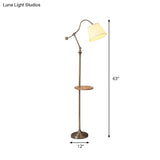 Modern Bronze Swing Arm Floor Lamp With Metallic Barrel Shade