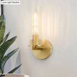 Modern Clear Glass Brass Wall Sconce With Cylinder Design - Perfect For Bedside Lighting