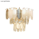 Modern Crystal Wall Sconce With Tapered Design Golden Accents And Acrylic Leaves