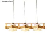 Modern Cubic Frosted Glass Island Pendant Lamp With Wood Cage And 3 Beige Bulbs