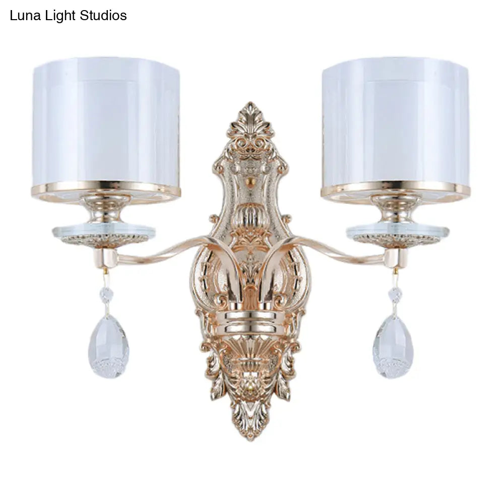 Modern Dual Cylinder 2-Light Gold Wall Sconce With Clear And Frosted Glass