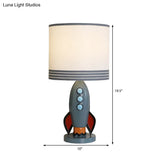 Modern Fabric Drum Shade Table Lamp With Resin Rocket Base - 1 Light White Lighting