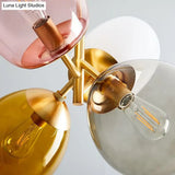 Modern Glass Chandelier with Multiple Elliptical Pendants and 4 Colorful Lights Gold